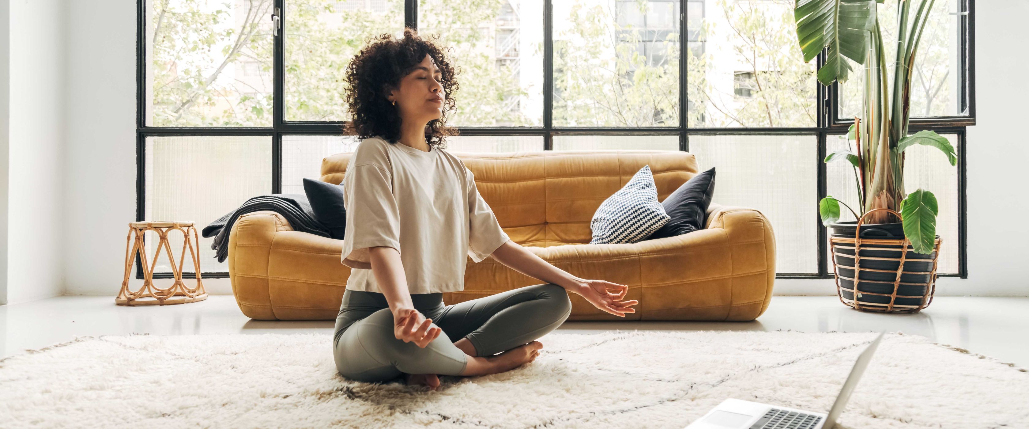 Woman meditating on the ground