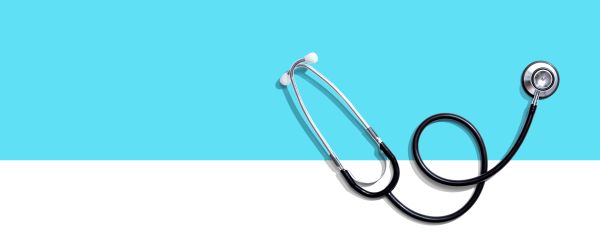 Stethoscope on blue background 