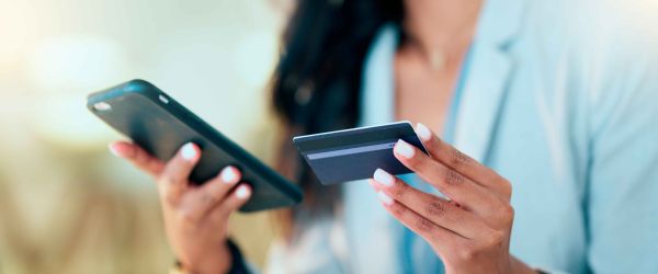 Woman holding a credit card