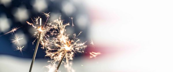 Sparkler in front of american flag