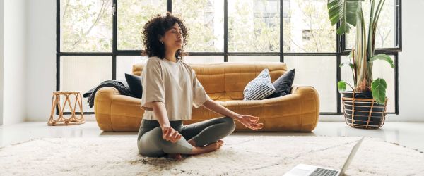 Woman meditating on the ground