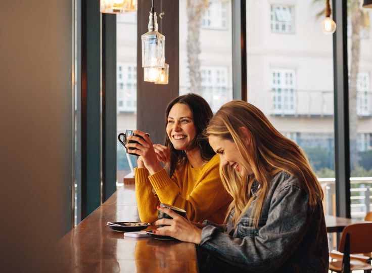 Two woman at a coffee shop