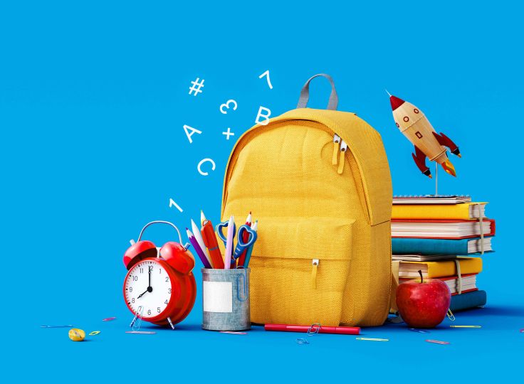 School supplies on blue background